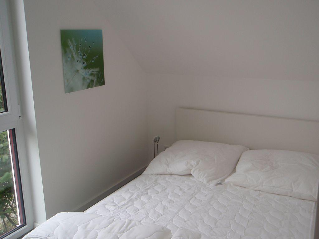 Schlafzimmer mit Doppelbett